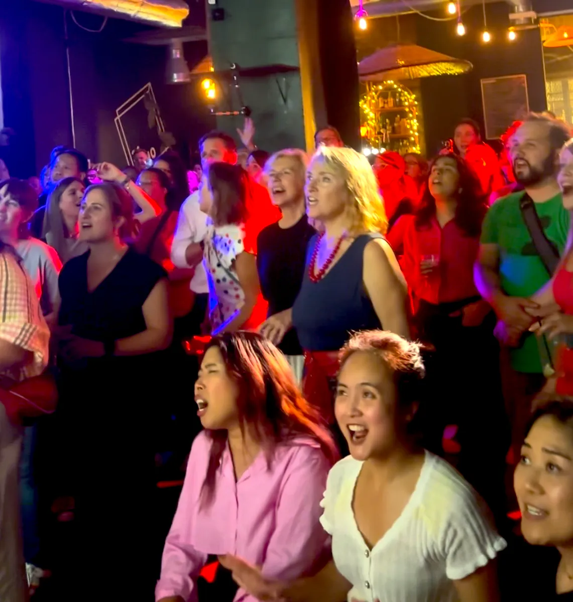 Singing along at Choir Party in the pub
